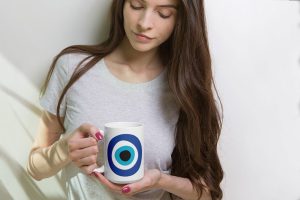 A woman holding Glossy Mugs