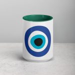 Unveiling the Ancient Evil Eye - Mug with Dark Green Color Inside