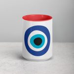 Unveiling the Ancient Evil Eye - Mug with Red Color Inside